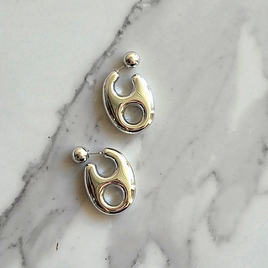 Brinco Órbita – ABS (Dourado/Prata) | Leve | Moderno